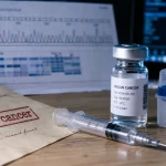 Vaccin cancer : seringue, ARN messager et essai clinique dans le mélanome